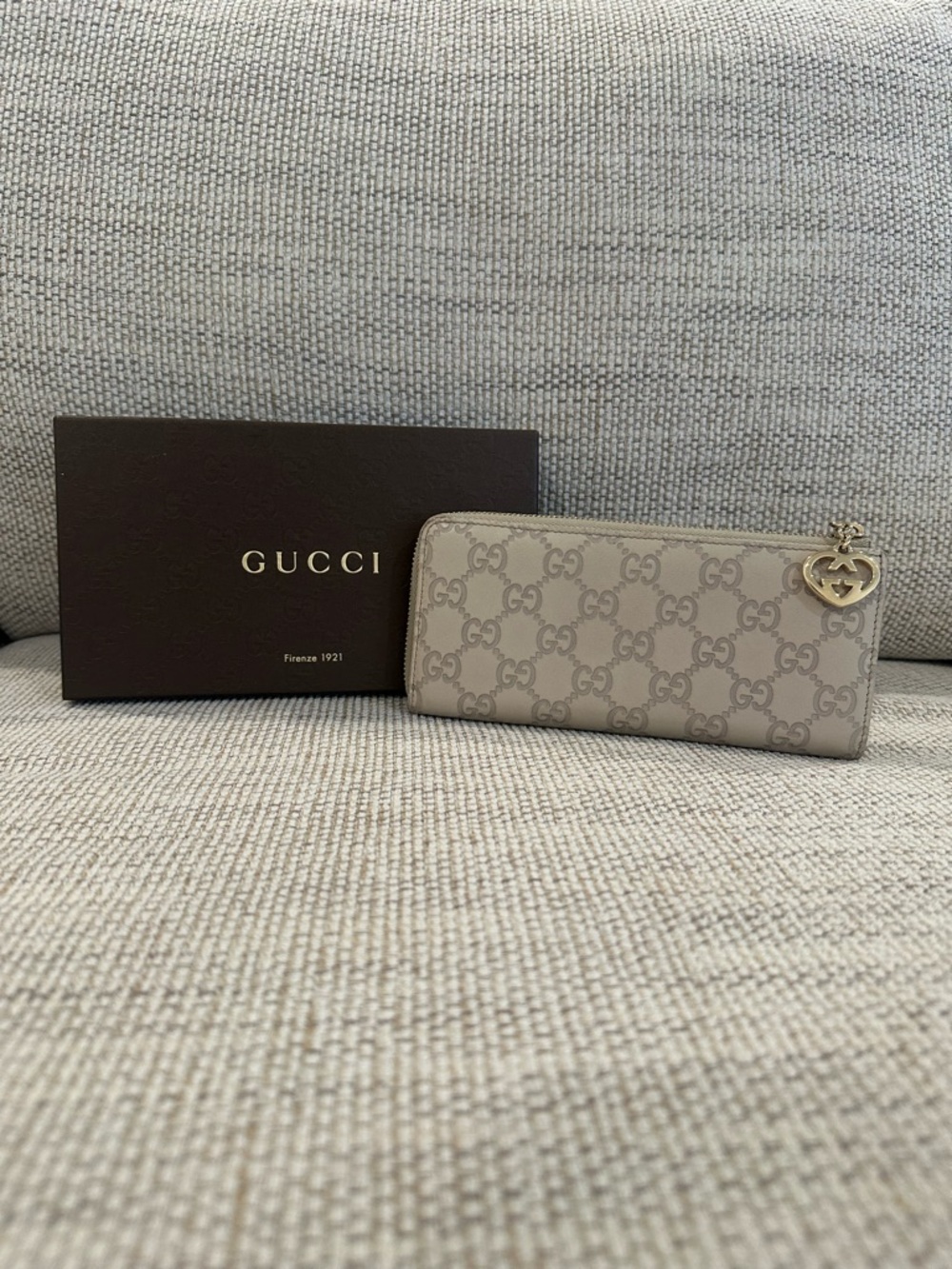 Gucci Guccissima GG Supreme Zip Wallet with Gold Heart Charm